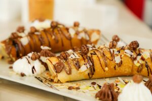 Crepes alla nutella perfette, sottili e dorate, pronte da gustare senza rompersi.