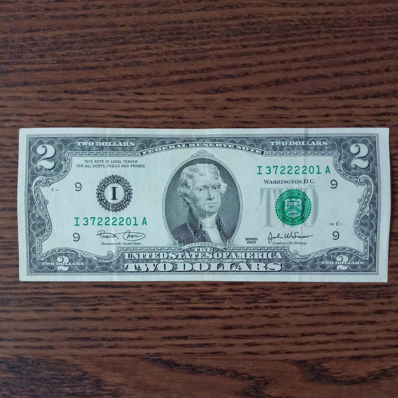 Dollaro americano da collezione con numero di serie unico in evidenza.